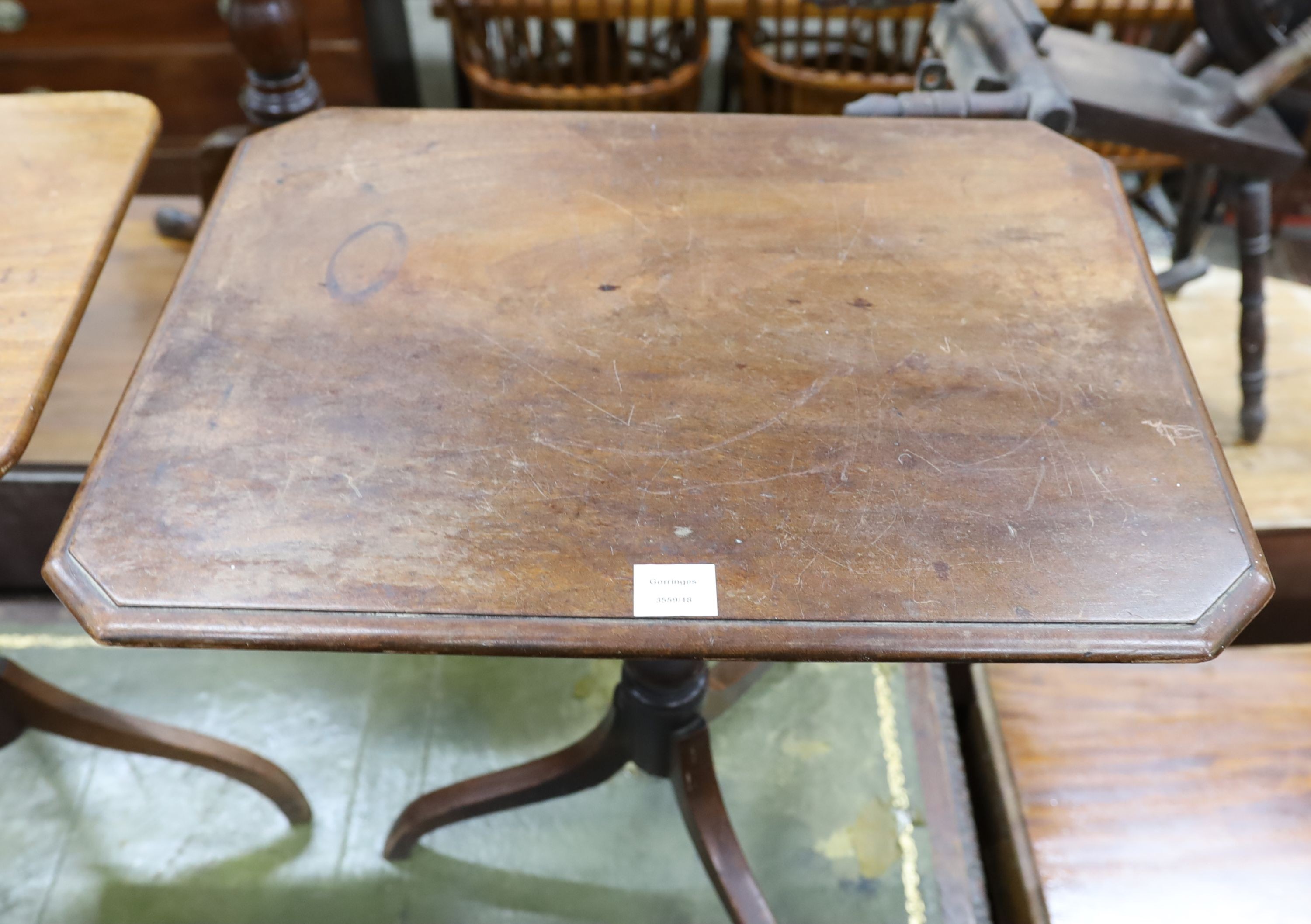 A Regency banded mahogany tilt top wine table, width 63cm, depth 50cm, height 70cm